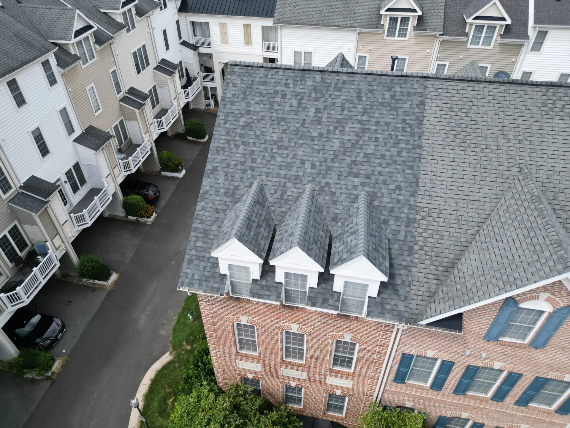 Brick and gray roof townhouses