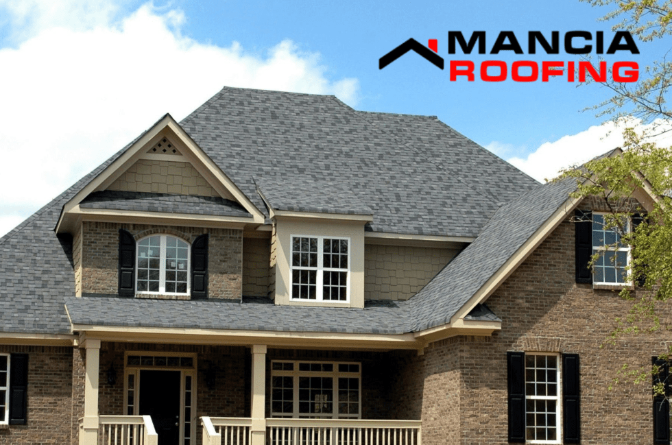 House with gray shingles and logo
