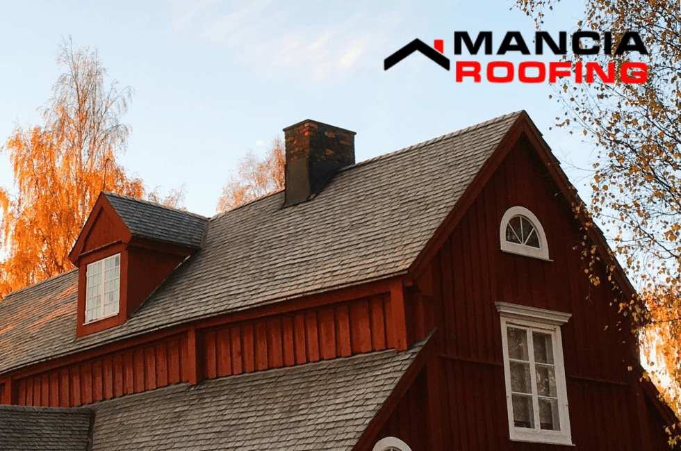 Traditional house and chimney in fall