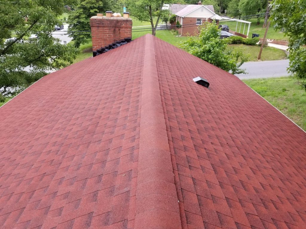 House roof with red shingles